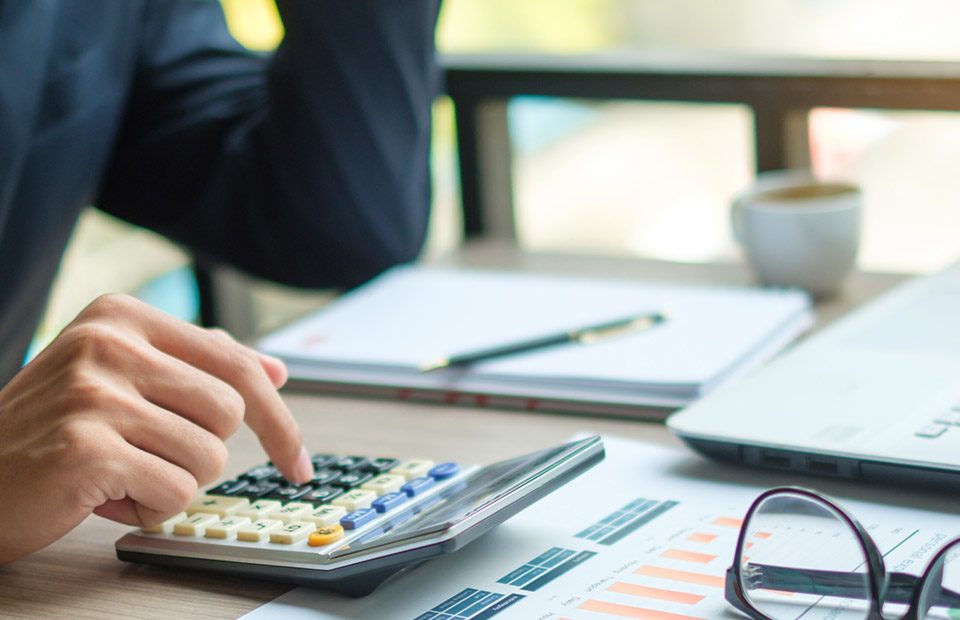 person using a calculator
