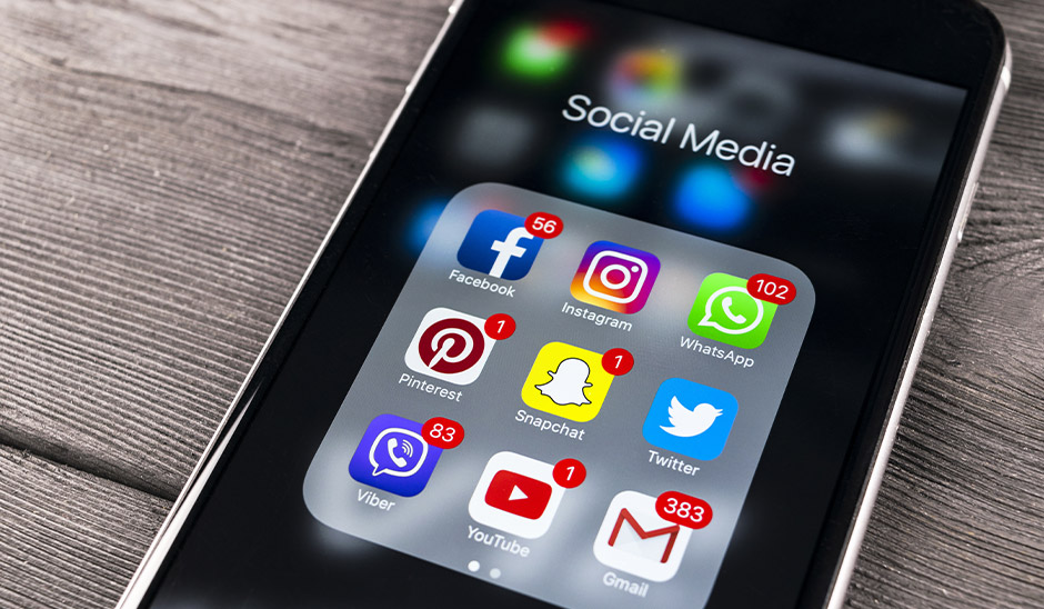 iphone screen with social media icons
