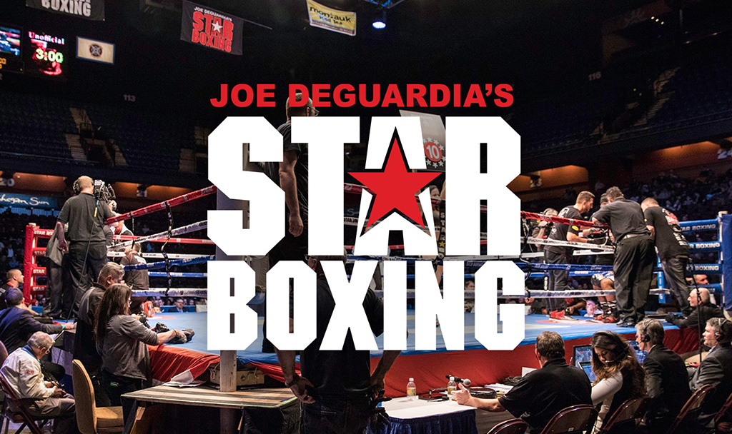 Boxing event featuring Joe DeGuardia's Star Boxing logo and fighters in the ring.
