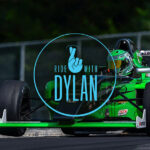 A green race car on a track with the logo 'Ride with Dylan' superimposed.