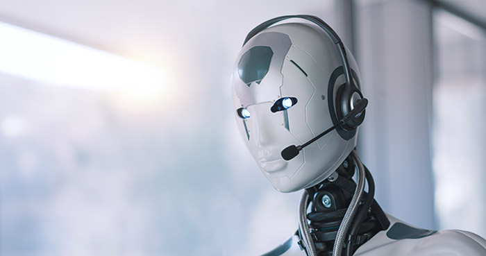 A close-up of a humanoid robot with headphones, featuring blue LED eyes and a sleek design.