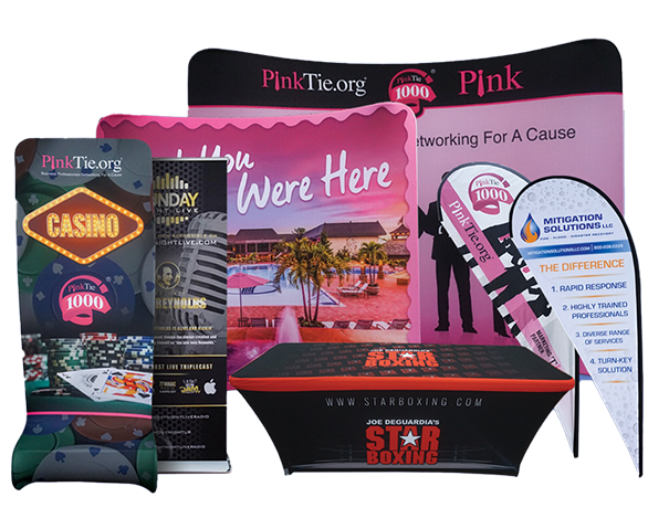 Various trade show displays featuring branding for PinkTie.org and Star Boxing.