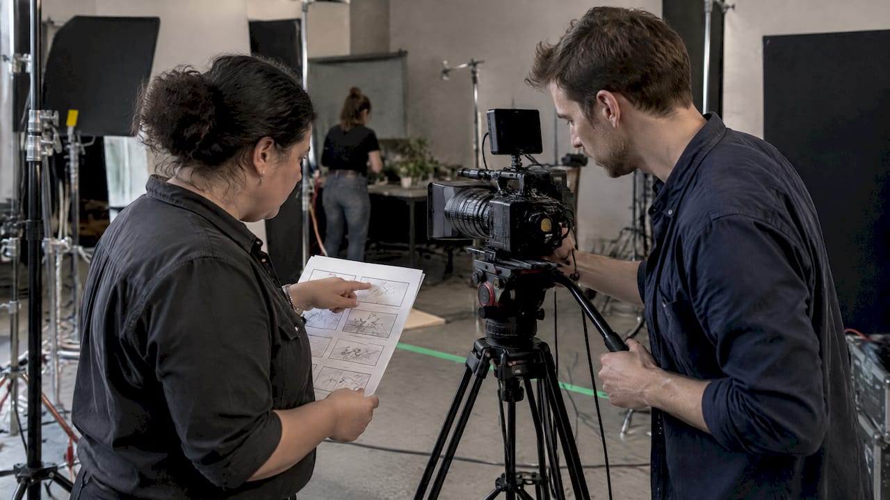 Crew matching storyboard panels to camera setup
